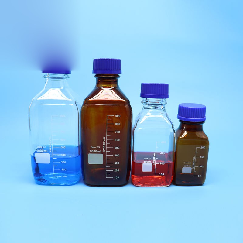 Square borosilicate glass reagent vial with blue screw cap and graduation marks