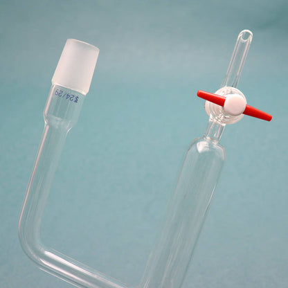 Glass water distributor with PTFE/glass piston stopcock