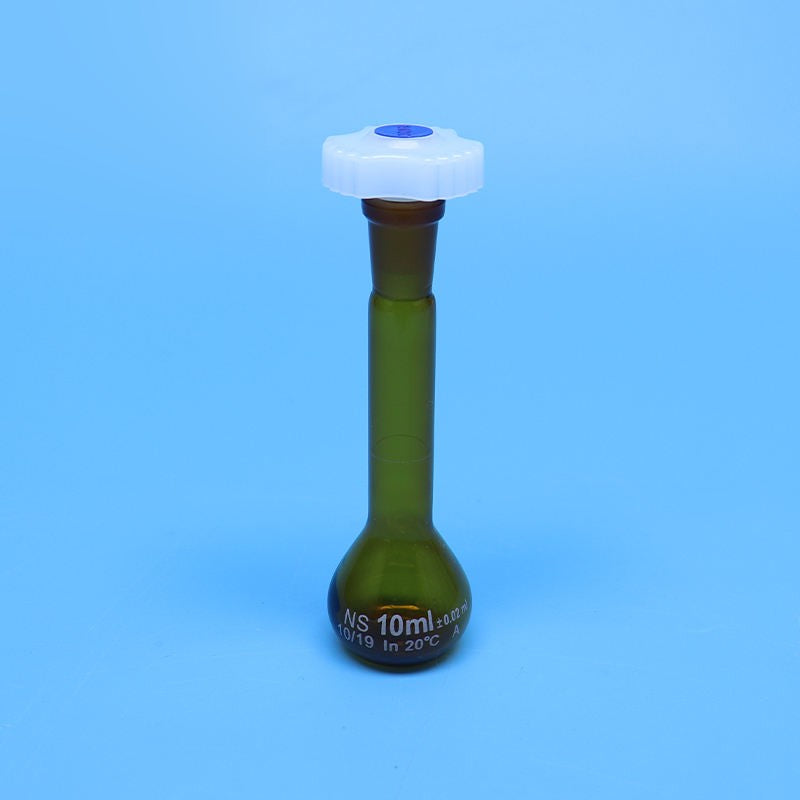 Laboratory brown glass volumetric flask with plastic stopper