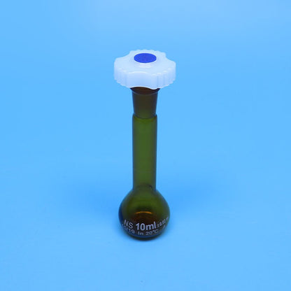 Laboratory brown glass volumetric flask with plastic stopper