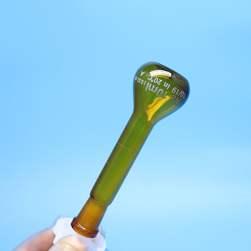 Laboratory brown glass volumetric flask with plastic stopper
