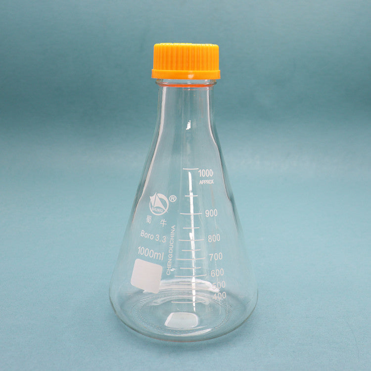 Glass conical flask with orange screw caps for tissue culture