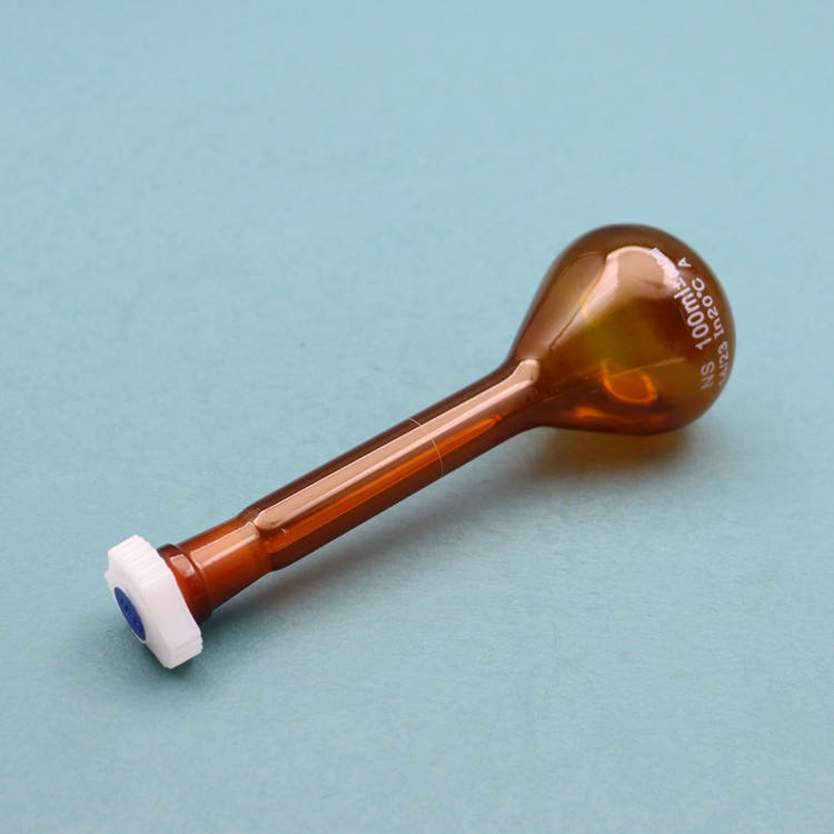 Volumetric flask with plastic stopper