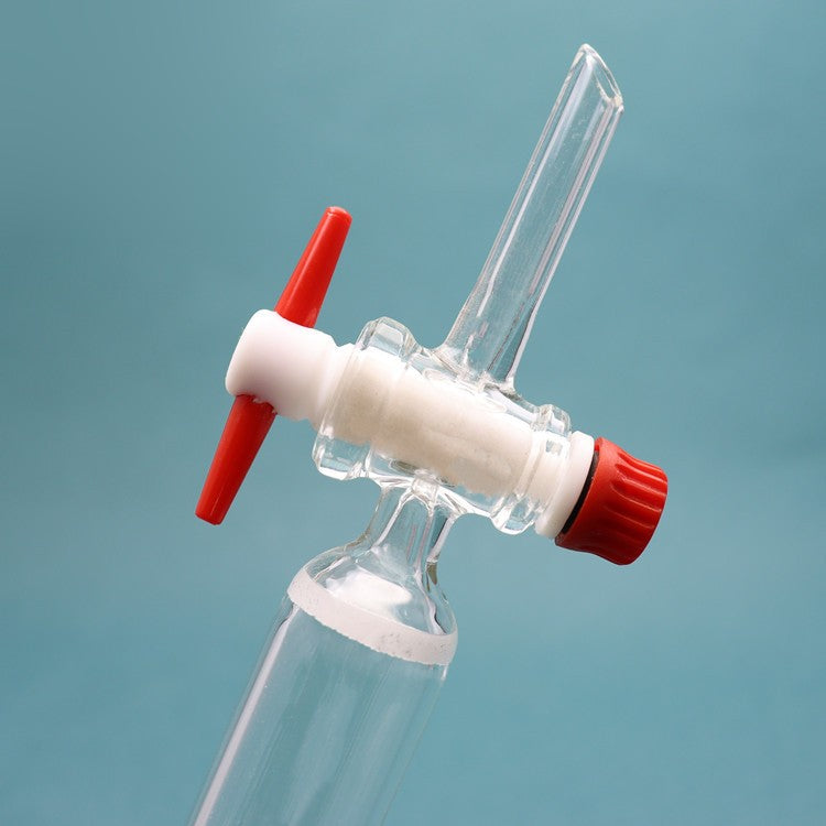 Glass chromatographic column with storage/reservoir ball and PTFE piston for flash chromatography