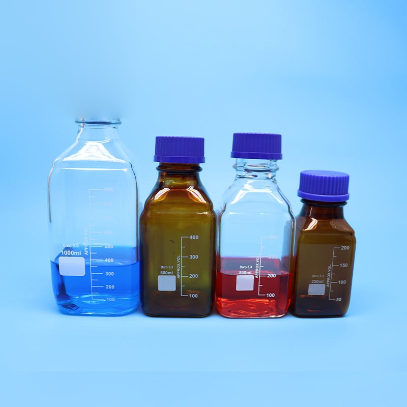 Square borosilicate glass reagent vial with blue screw cap and graduation marks