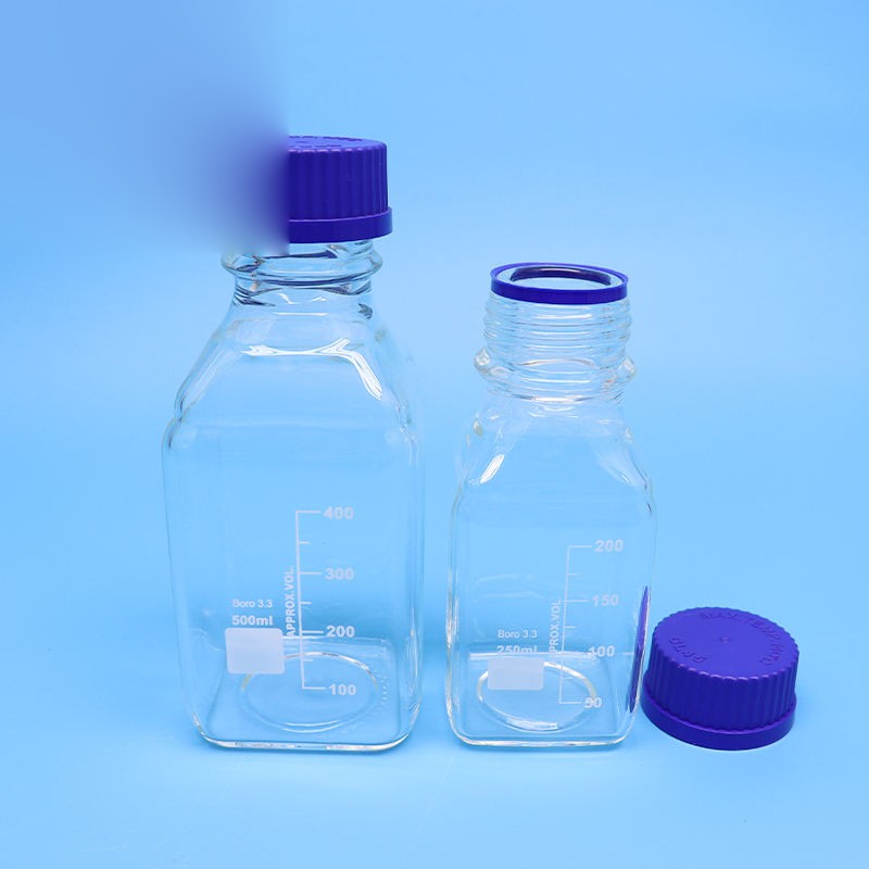 Square wide-mouth borosilicate glass reagent bottle with blue screw cap
