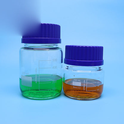 Wide-mouth borosilicate glass reagent bottle with blue screw cap