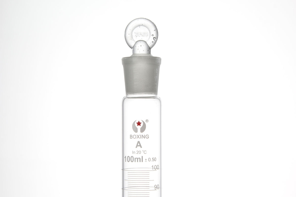 Graduated glass measuring cylinder