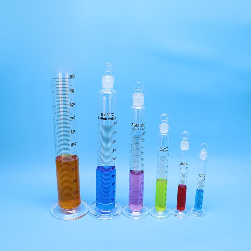 Borosilicate glass measuring cylinder with plug/stopper