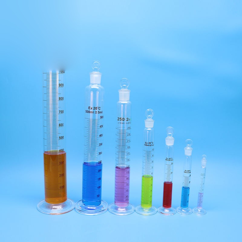 Borosilicate glass measuring cylinder with plug/stopper