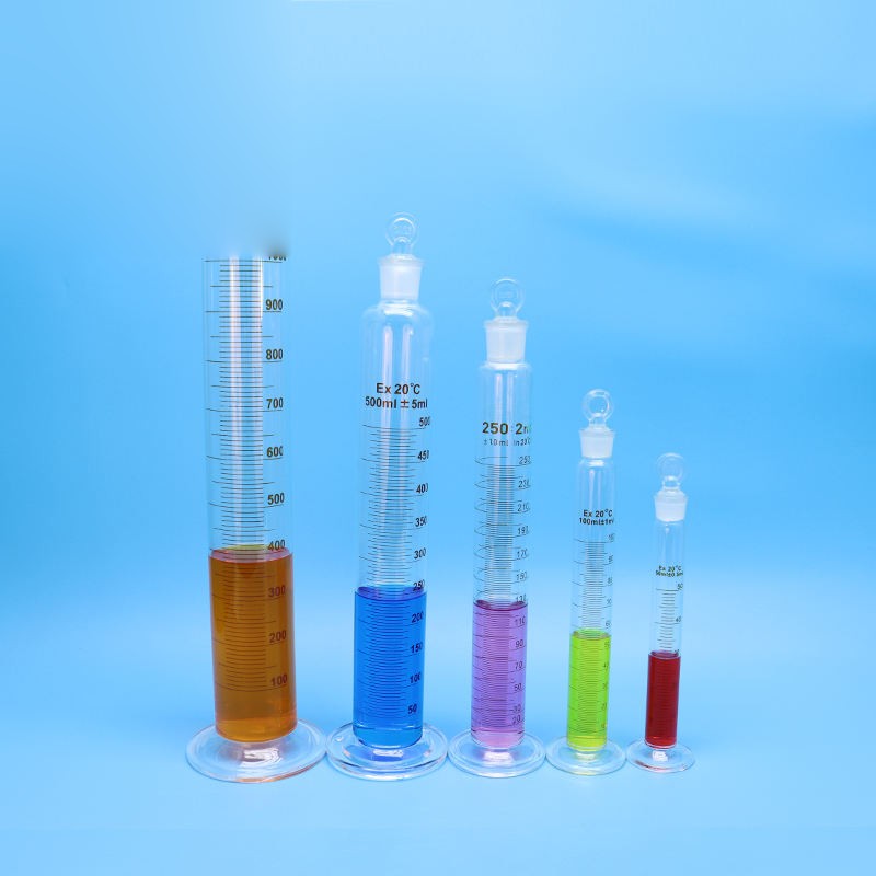 Borosilicate glass measuring cylinder with plug/stopper