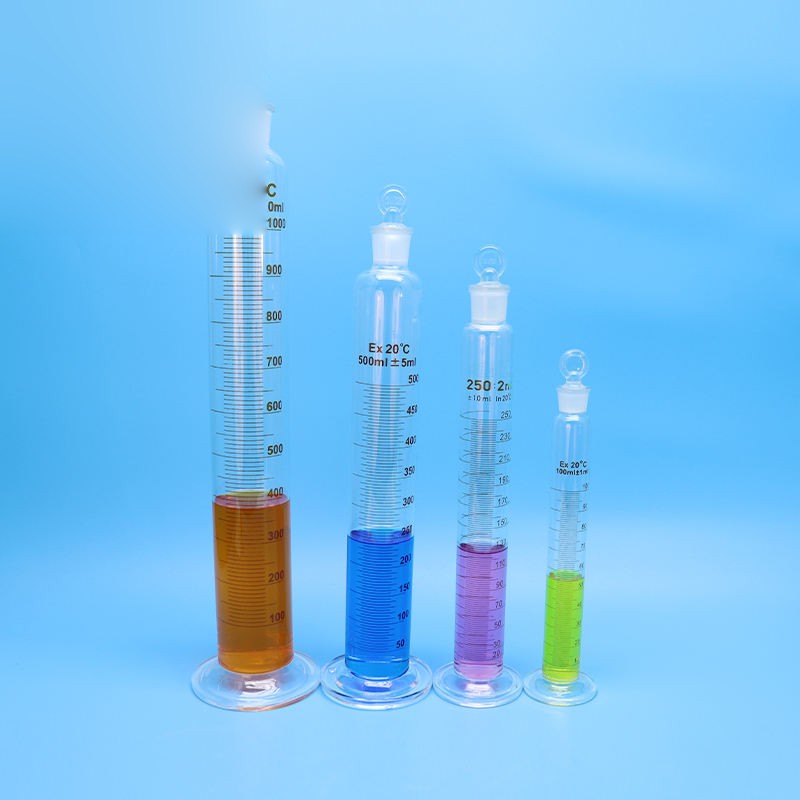 Borosilicate glass measuring cylinder with plug/stopper