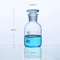 Narrow mouth bottle, clear glass, graduated, 60 ml to 20.000 ml