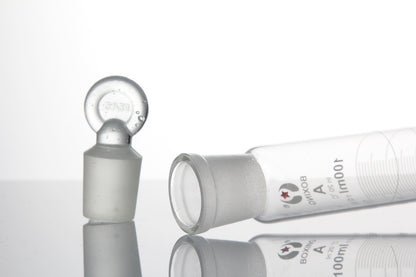 Graduated glass measuring cylinder