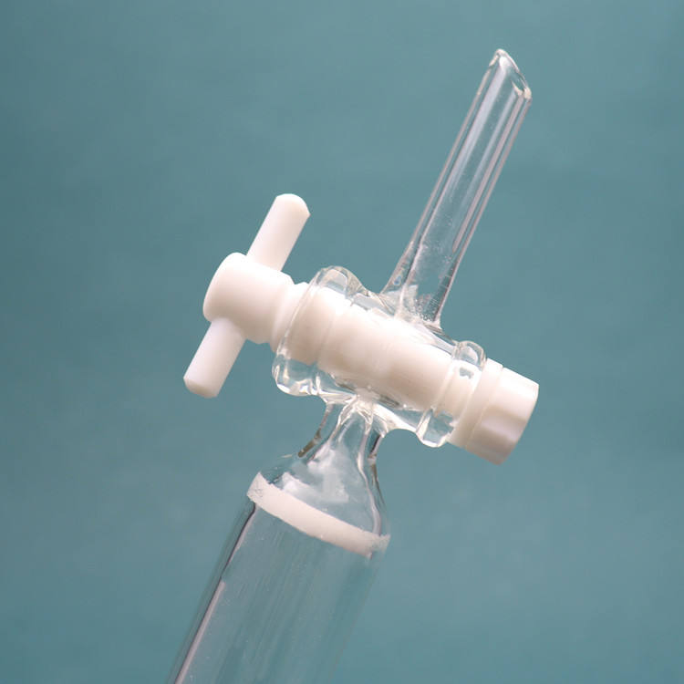 Glass chromatographic column with storage/reservoir ball and PTFE piston for flash chromatography