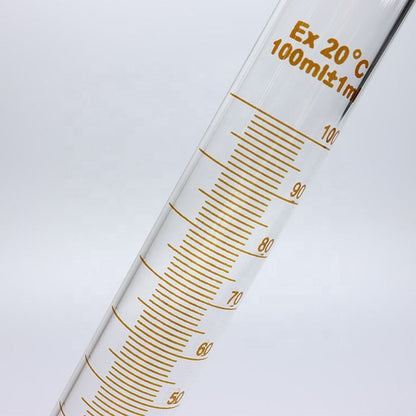 Single thick-walled Boro 3.3 glass graduated measuring cylinder with spout and graduation; matches title