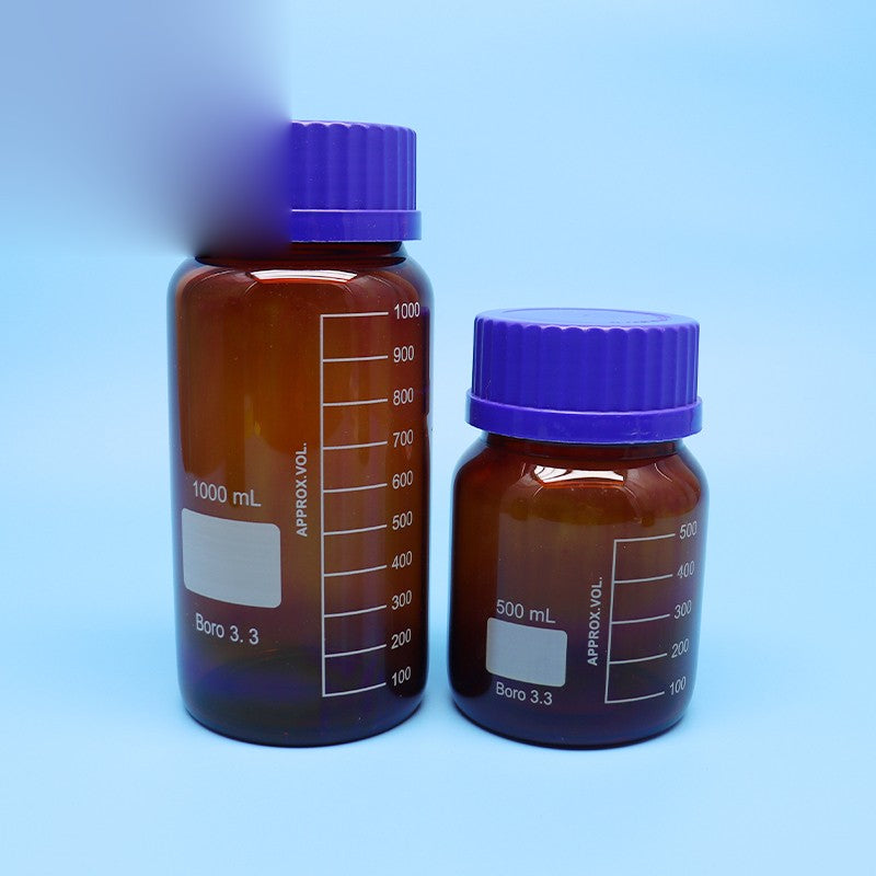 Amber borosilicate glass reagent bottle with blue screw cap
