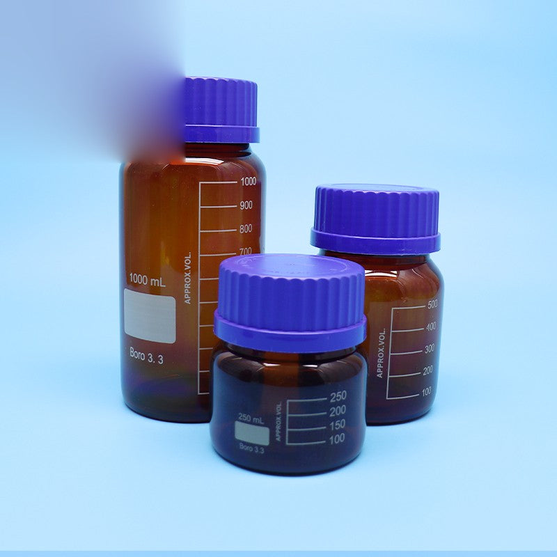 Amber borosilicate glass reagent bottle with blue screw cap