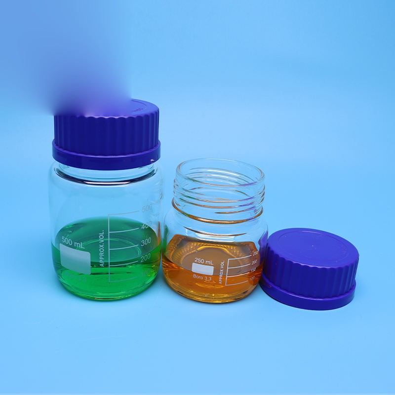 Wide-mouth borosilicate glass reagent bottle with blue screw cap
